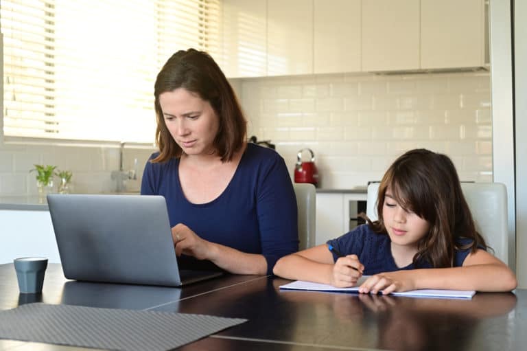 Mother working from home with Daughter